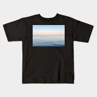 Abstract sunrise over water Kids T-Shirt